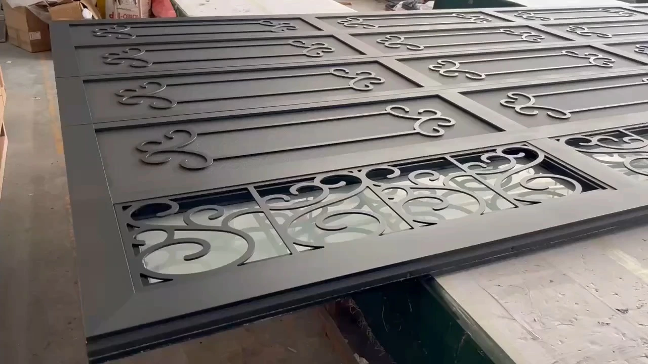 Classic Georgia wrought iron garage door featuring intricate designs and glass inserts for a timeless and sophisticated look 1