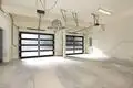 Black Aluminum and Glass Garage Door by Master Home 5