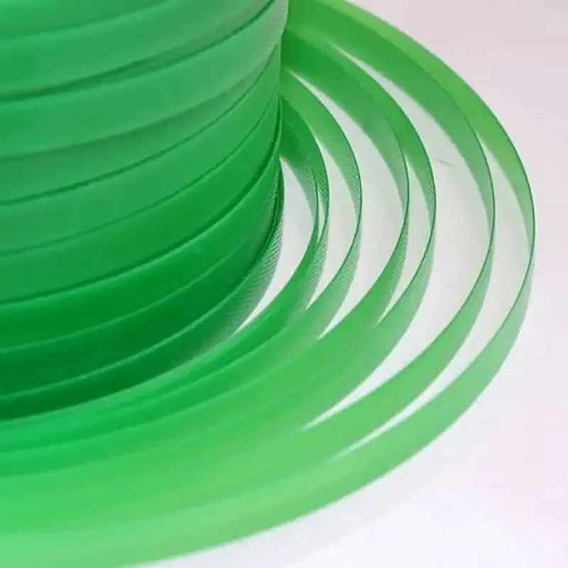 Rotolo di cinghia in PET in materiale plastico ad alta resistenza goffrato verde per uso con macchine automatiche 4