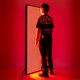 over view the using effect of  S3000PRO red light therapy panel with human in front of it