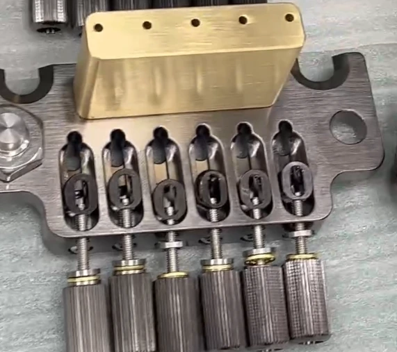 Precision CNC Machined Electric Guitar Bridge – Built for Tone and Stability 1