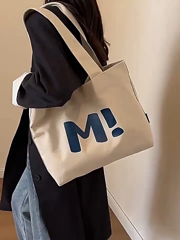 Bolsa de lienzo resistente de gran capacidad, bolsa de compras simple y versátil, nueva bolsa de un solo hombro 1
