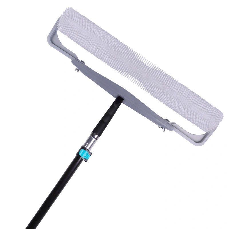 Self-leveling spiked roller with adjustable extension pole, ideal for eliminating air bubbles in concrete, epoxy resin and smoothing mortar surfaces 1