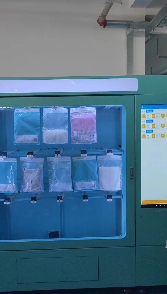 Clothing Vending Machine with 43’’ touchscreen, customizable payment systems, 24/7 apparel retail, OEM/ODM factory direct supplier, wholesale vending solution for malls, airports, and campuses.