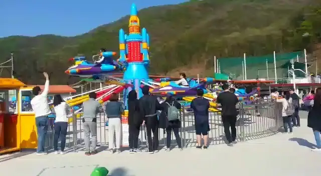 24 - Seat Self - Controlled Aircraft Amusement Ride: Rocket - Themed, LED - Lit Fun with Adjustable Flight 1