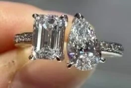 18K white gold pear-shaped and emerald-cut laboratory diamond ring 1