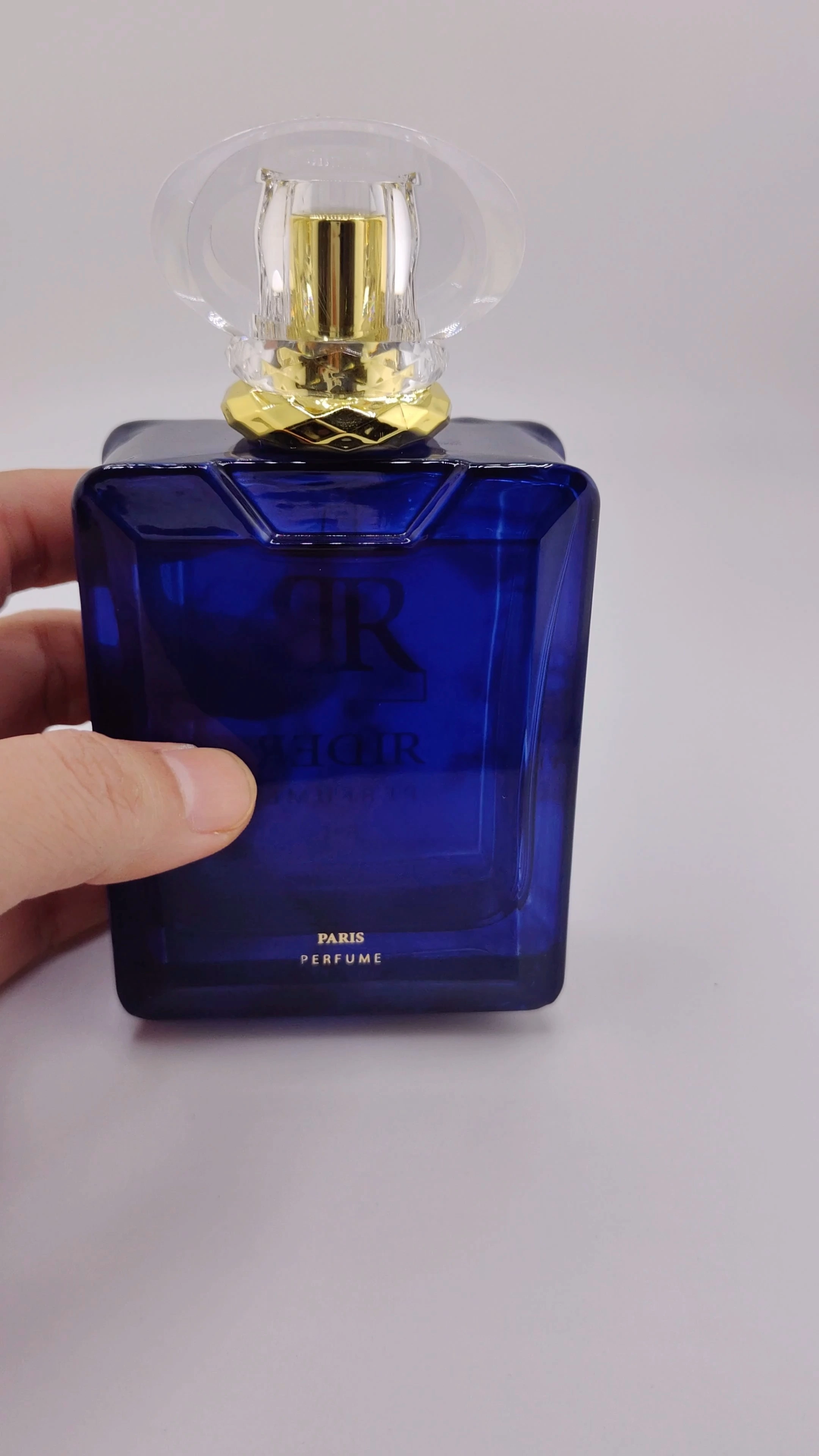 Botella de perfume rectangular de 100 ml, azul, vacía, con caja, de alta calidad, con pulverizador, venta al por mayor. 1