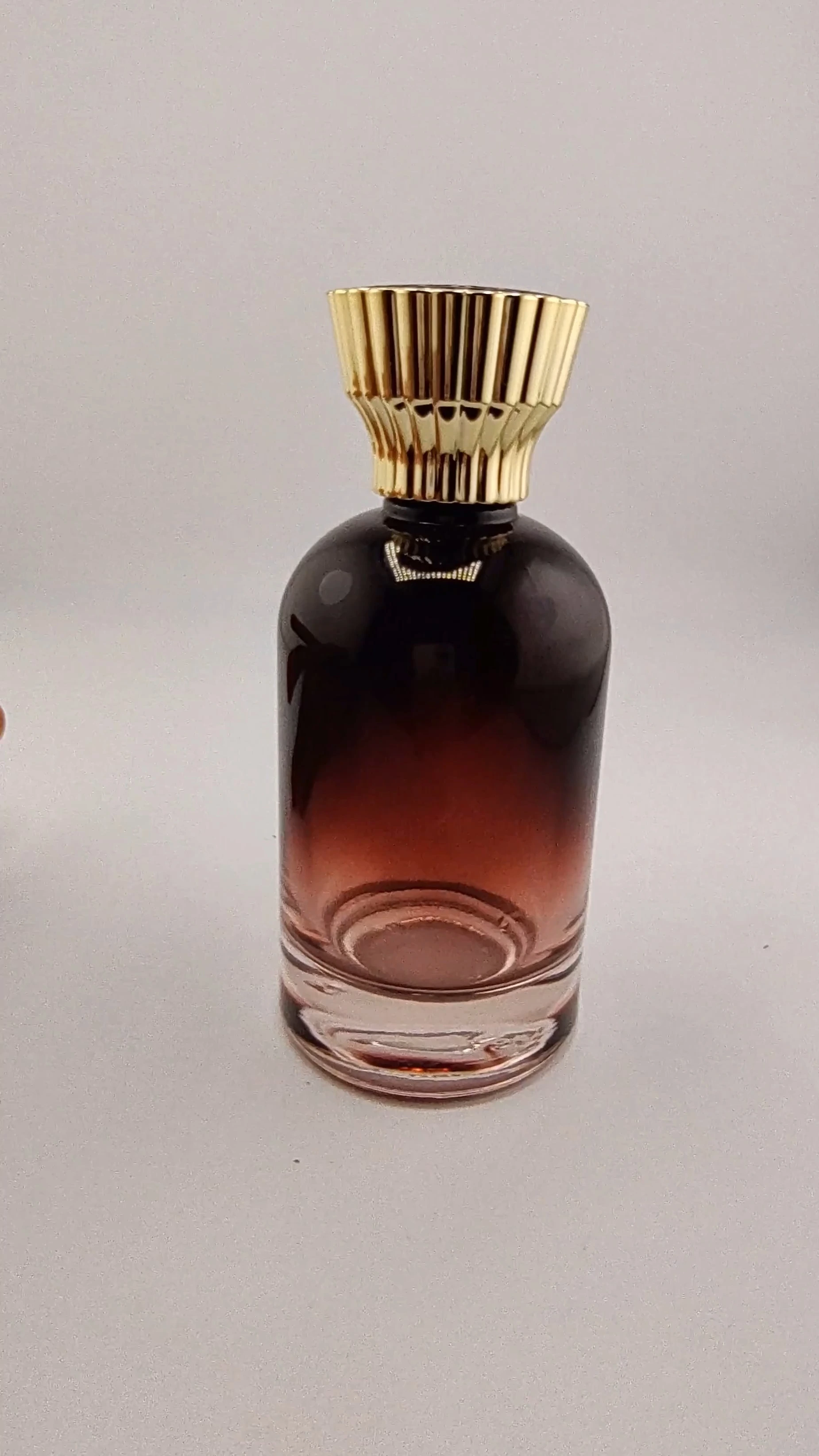 Botella de perfume redonda de lujo de cristal ámbar negro con aroma a ámbar, 30 ml, 50 ml y 100 ml. 1