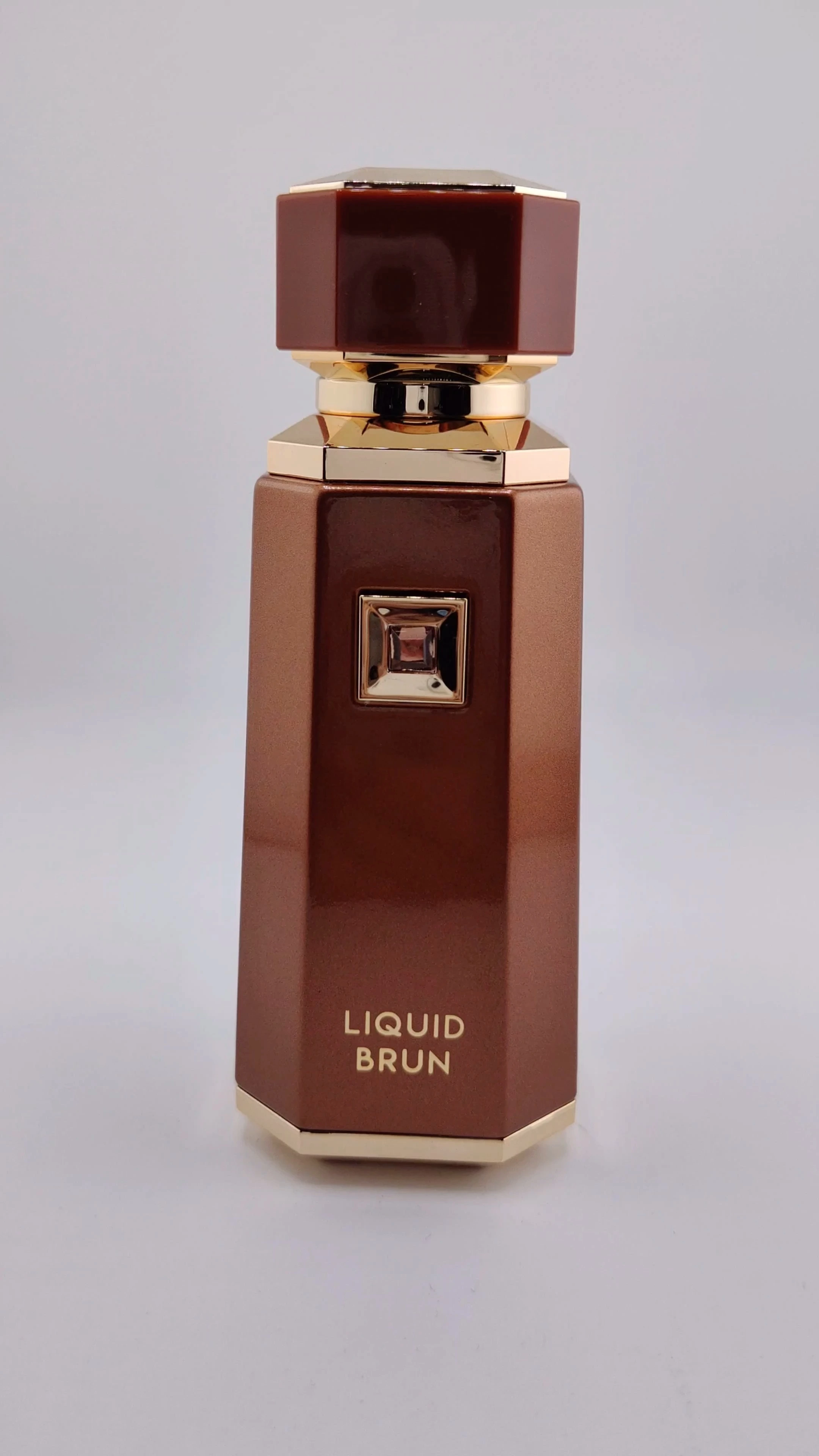 Botella de perfume redonda de 50 ml y 100 ml, color marrón, vacía, con caja, venta al por mayor. 1