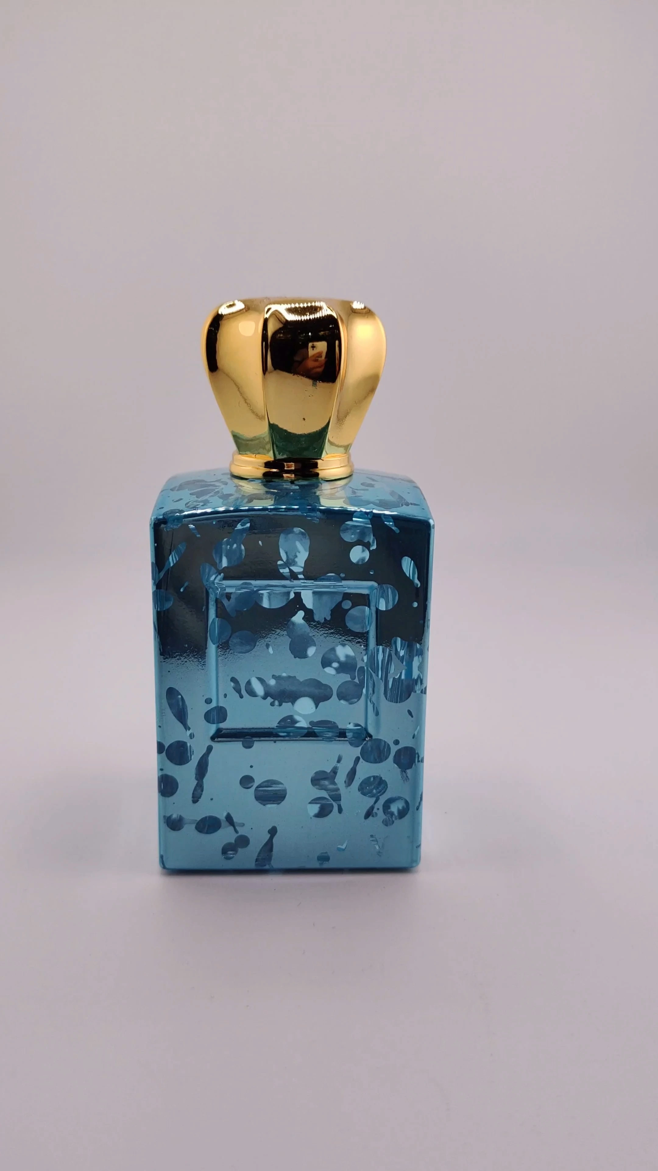 Botella de perfume de 100 ml de alta calidad al por mayor, fabricante de botellas de perfume rectangulares azules, botellas de perfume con atomizador vacías, botella de perfume de lujo. 1