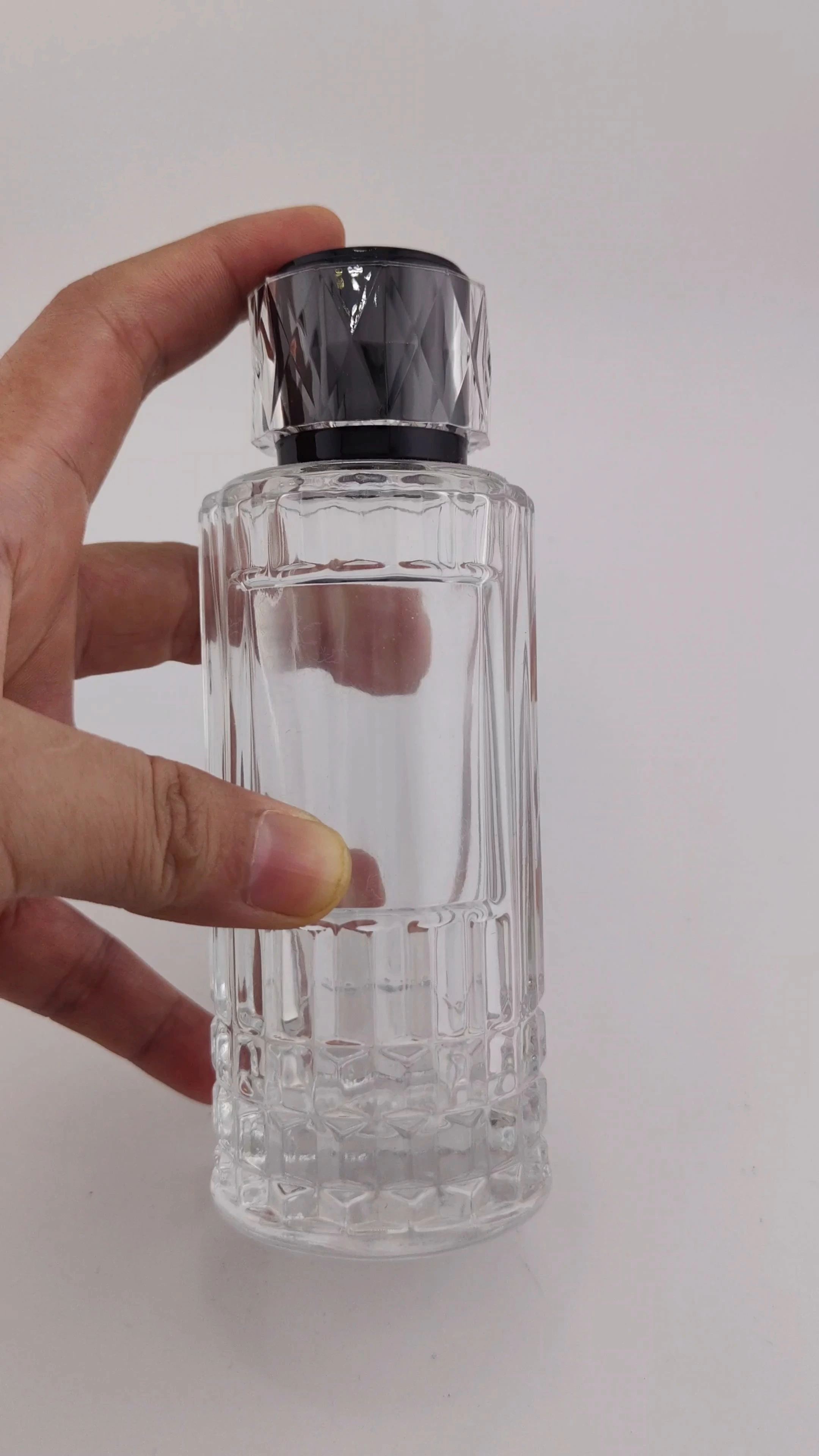 Botella de perfume vacía al por mayor, glamurosa, transparente, de vidrio de 30 ml, 50 ml y 100 ml, a un precio competitivo, de lujo, con caja. 1