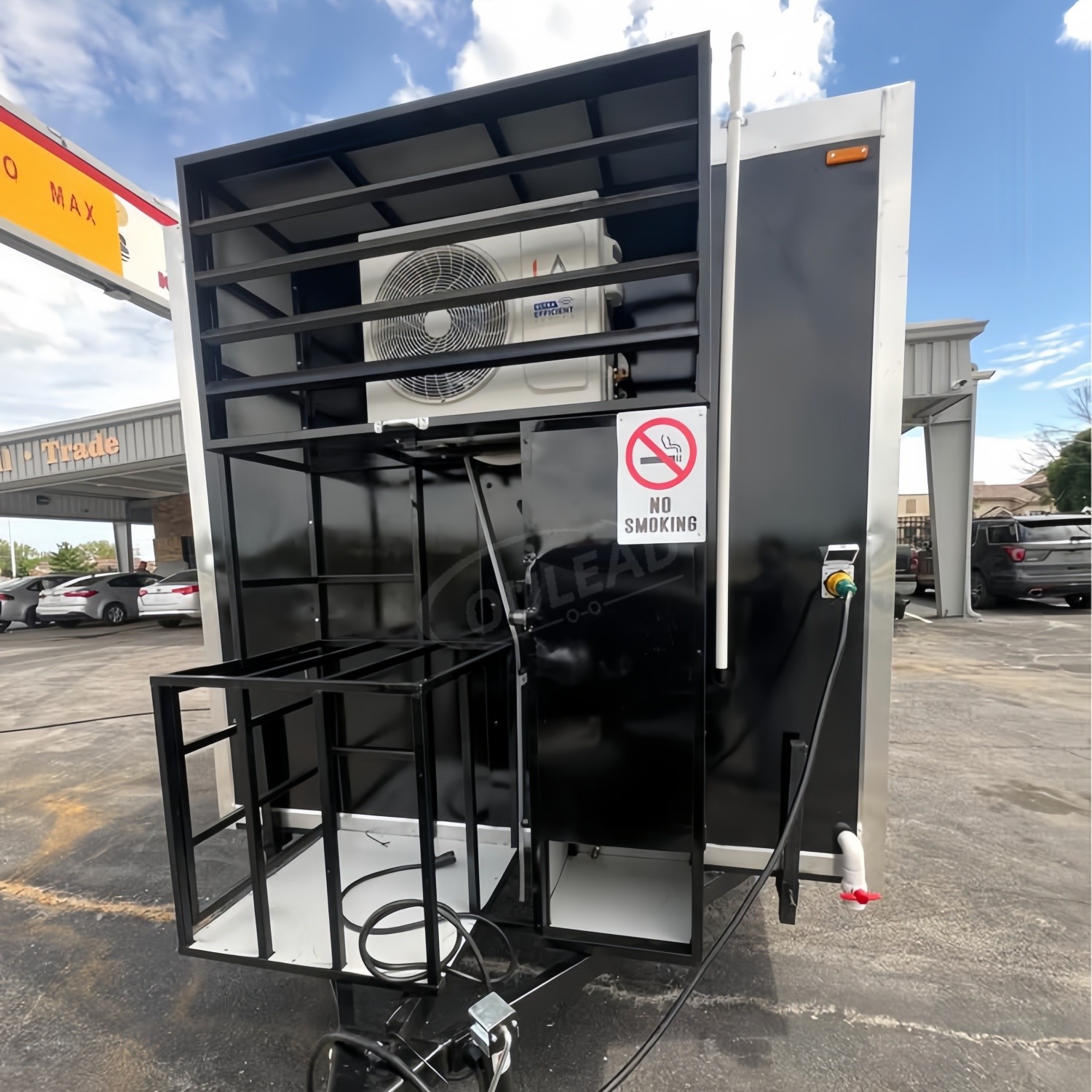 Sleek Black Dual - Axle Food Trailer with Stainless Steel Serving Window 8
