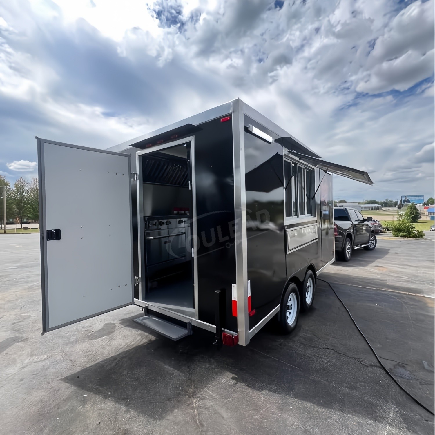 Sleek Black Dual - Axle Food Trailer with Stainless Steel Serving Window 5