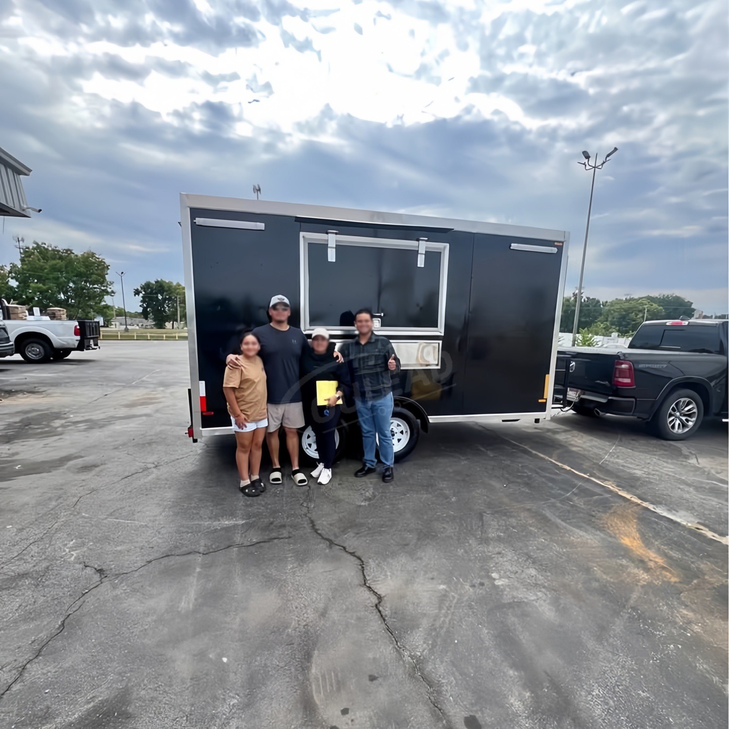 Sleek Black Dual - Axle Food Trailer with Stainless Steel Serving Window 3