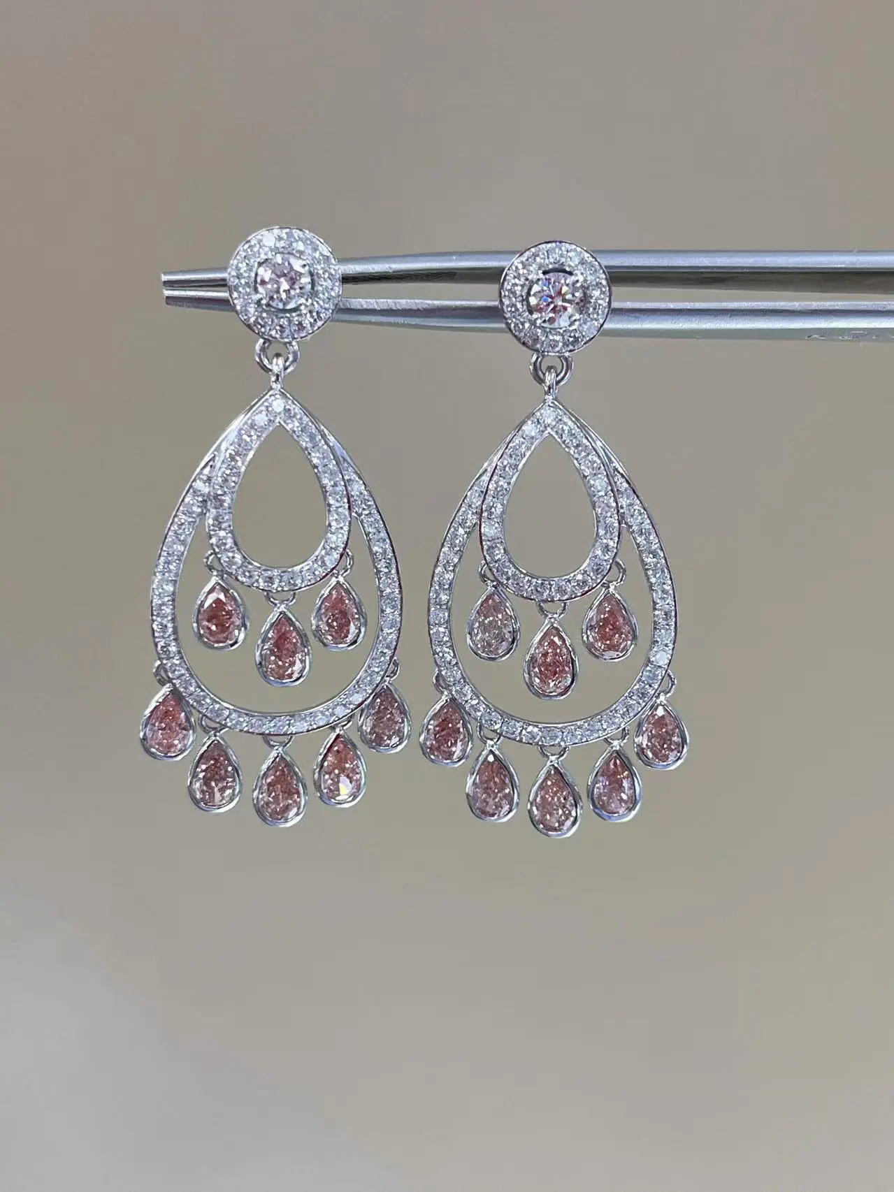 Luxurious Platinum Lab Grown Fancy Intense Pink Pear Cut VS1 Clarity Diamond Earrings 1