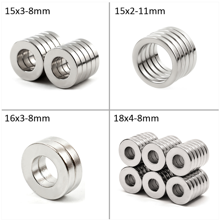 two nickel coated neodymium ring magnets on white background