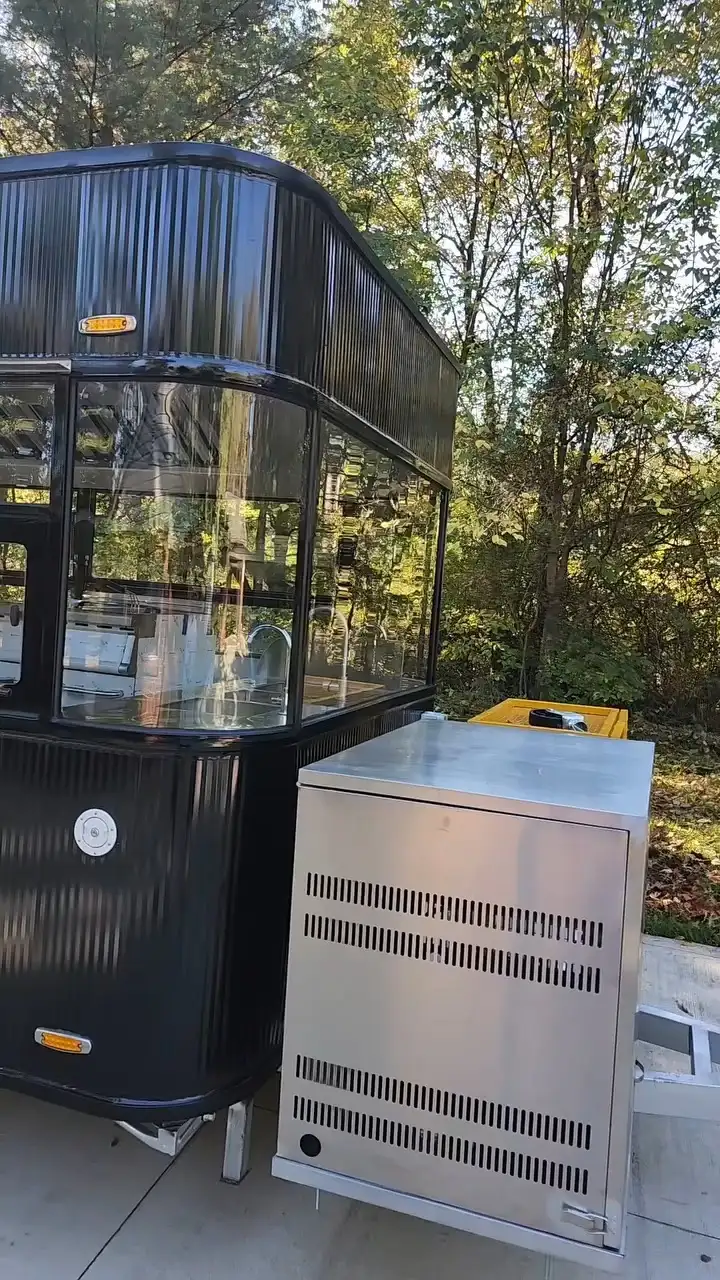 Black Corrugated Metal Dual-Axle Food Trailer: Full-Length Transparent Serving Window & Exhaust Hood 1