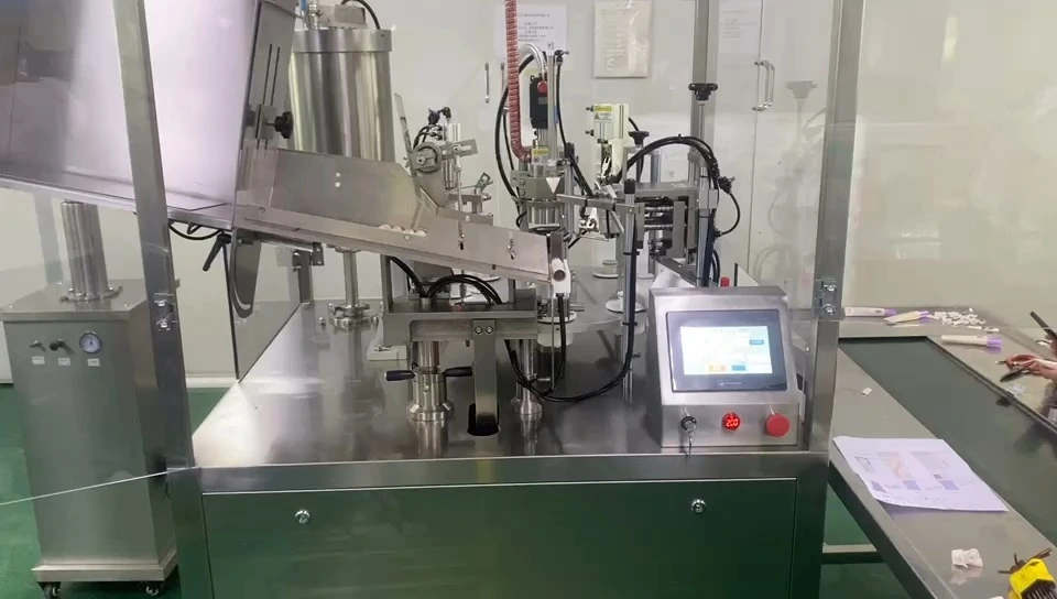 NF-40A Automatic plastic/laminated soft tube  filling & sealing machine 1