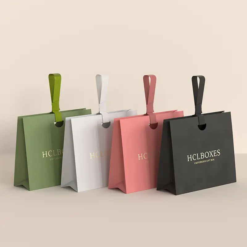 أكياس ورقية مثقبة يدوية الصنع، قابلة للتخصيص، لهدايا متاجر الملابس، وتغليف مشتريات التسوق، وأكياس الهدايا التذكارية - تُصنع حسب الطلب 1