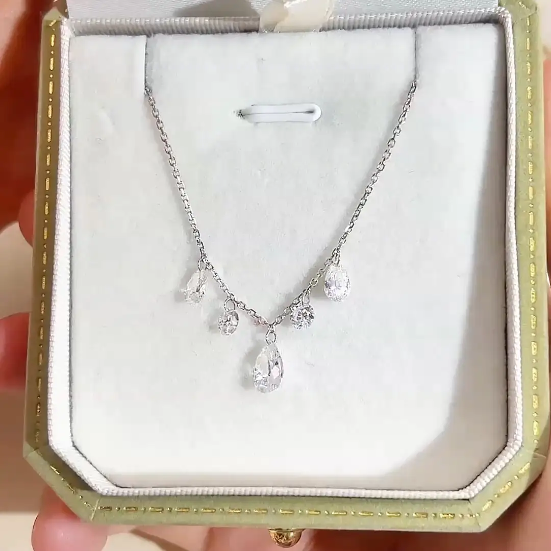 Colar MSN-959 em ouro 9K com diamante sintético em formato de pera de 1 quilate e colar com diamante sintético redondo da Messi Jewelry 1