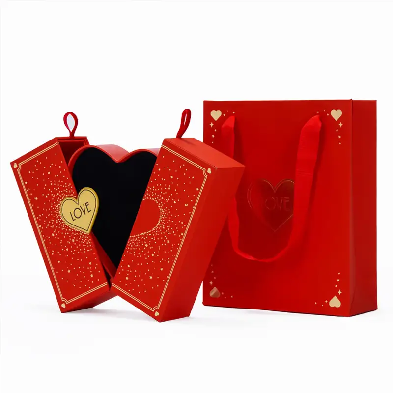 علبة هدايا مميزة بتصميم فريد وأصلي، مثالية للمجوهرات (خاتم، قرط، قلادة)، مصنوعة من ورق فني فاخر، مزينة بنقوش بارزة وطبقة طلاء مقاومة للأشعة فوق البنفسجية. 1