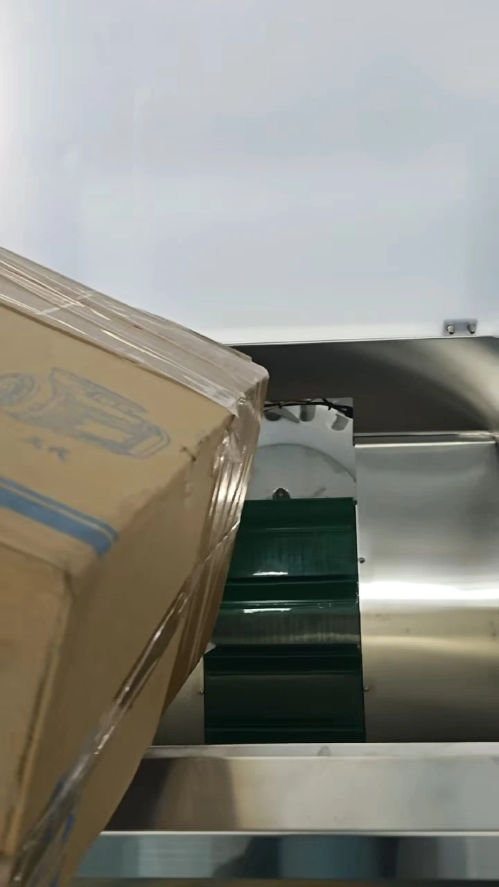 Automatic bottle unscrambler for plastic bottles feeding to conveyor 1