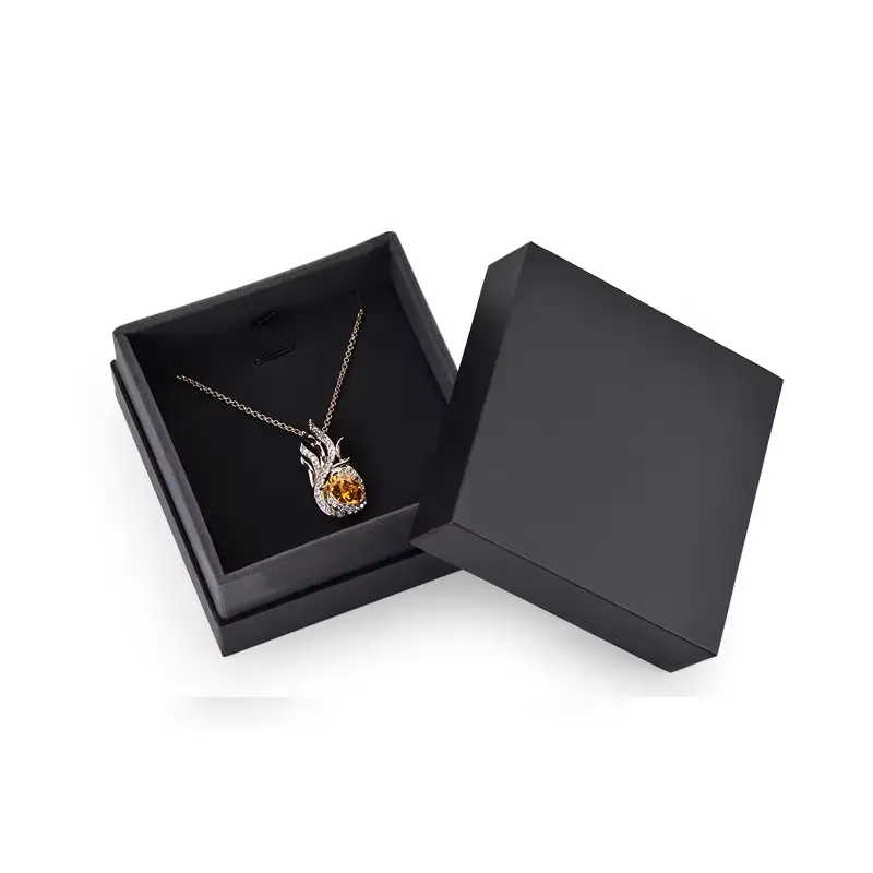 علبة قلادة صغيرة قابلة لإعادة التدوير، بغطاء وقاعدة قابلين للطي، مصنوعة من ورق مقوى مقوى، ومغلفة بطبقة لامعة غير لامعة، مناسبة لتقديمها كهدية في متاجر المجوهرات. 1