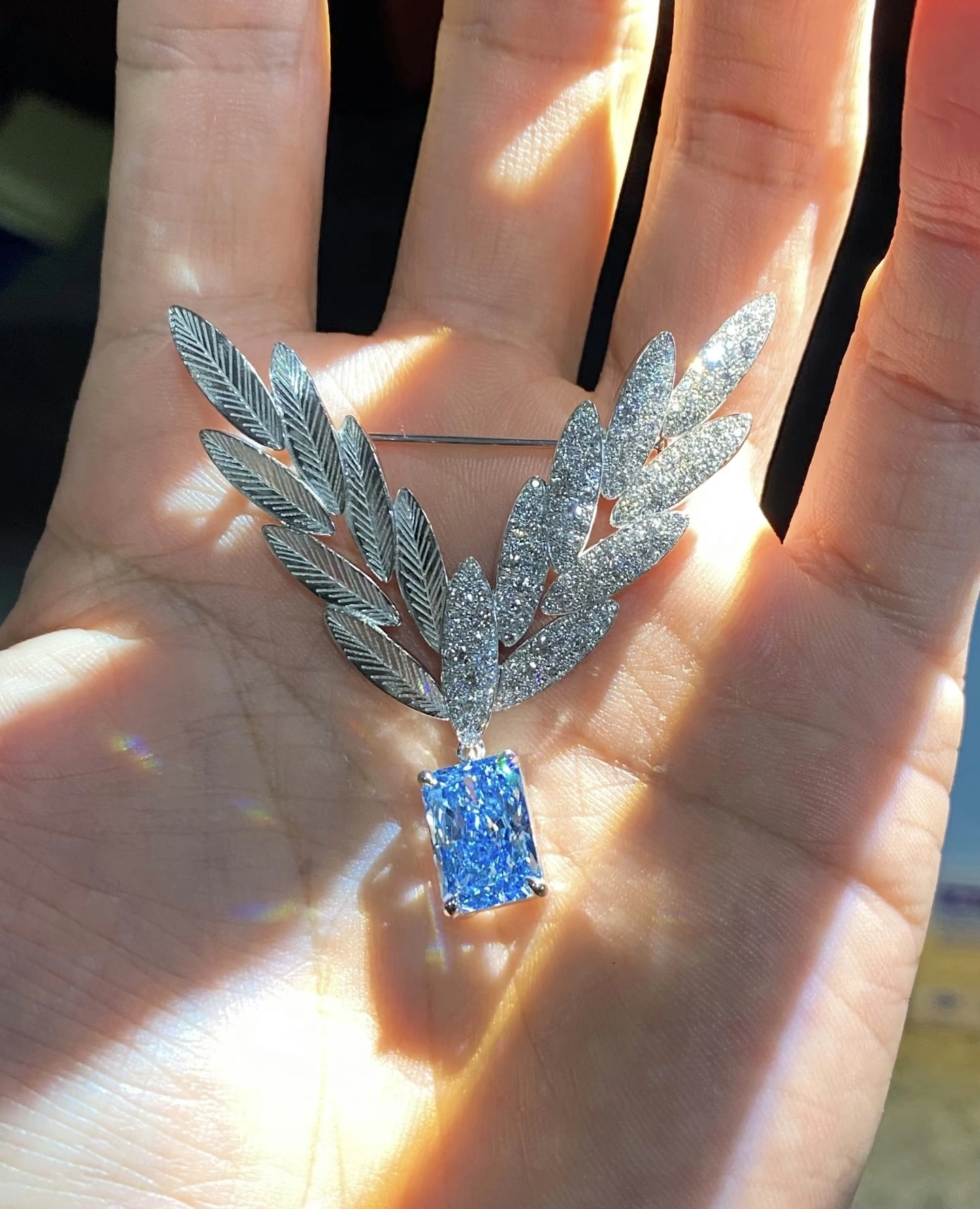 Serene Olive Leaf Brooch | Featuring a Blue Radiant Lab-Grown Diamond in Platinum 1
