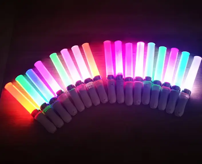 Vibrant Fan-Shaped Display of Wholesale Color-Changing LED Sticks for Mass Events