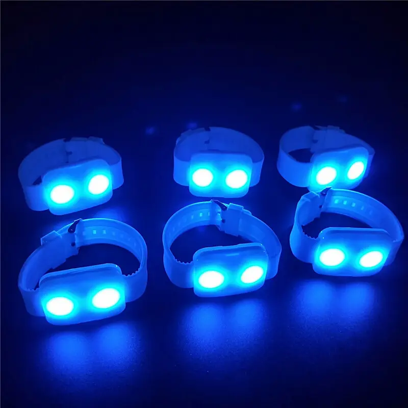 Blue custom LED wristbands with RF control for audience lighting