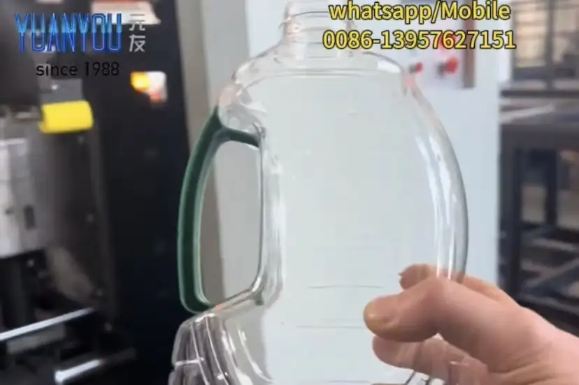 PET Handle Bottle Blow Molding Machine | Automatic PET Preform Blowing Machine 1