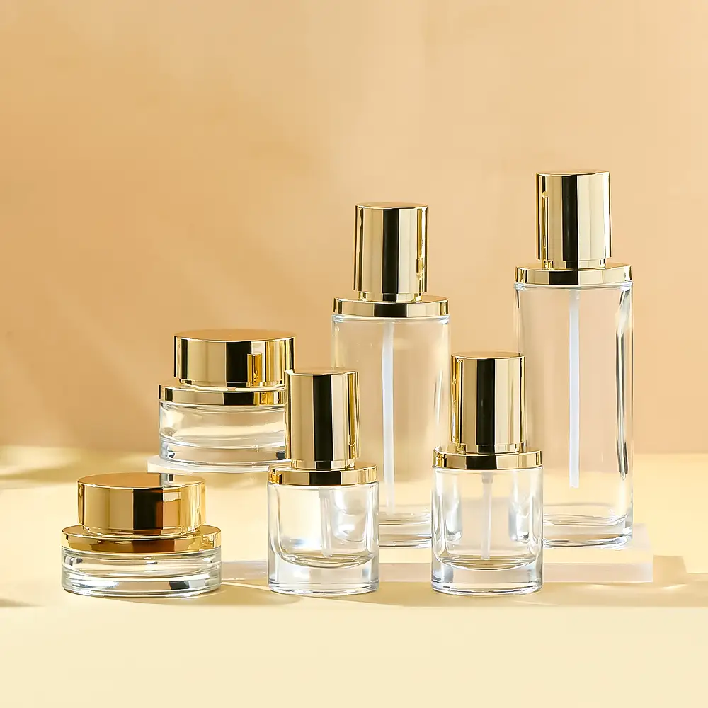 Transparent Glass Cosmetic Bottle Set with Electroplated Gold Caps | Luxury Skincare Packaging 1
