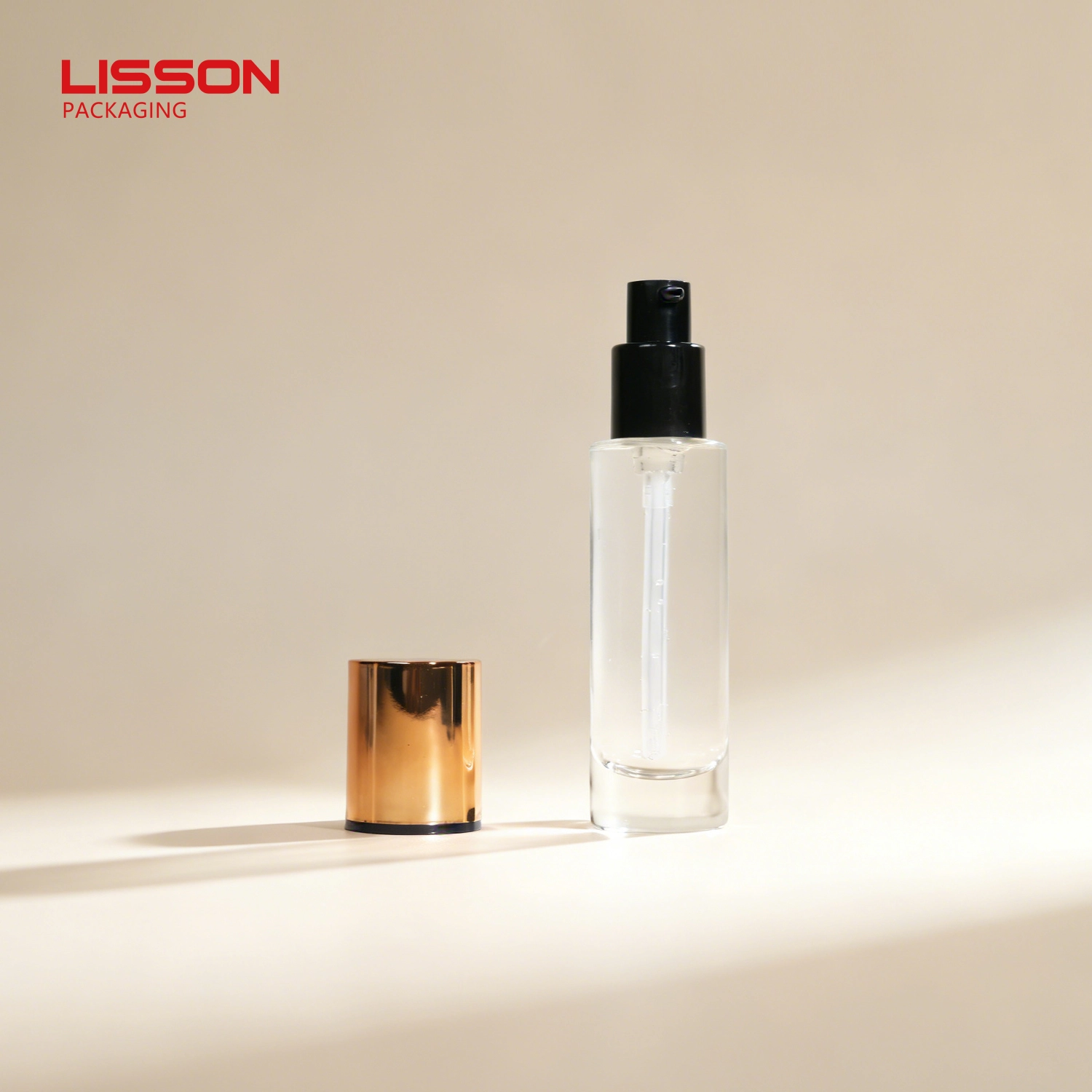 Customized 30ml Skincare Glass Pump Bottle with Plated Metallic Overcap 1