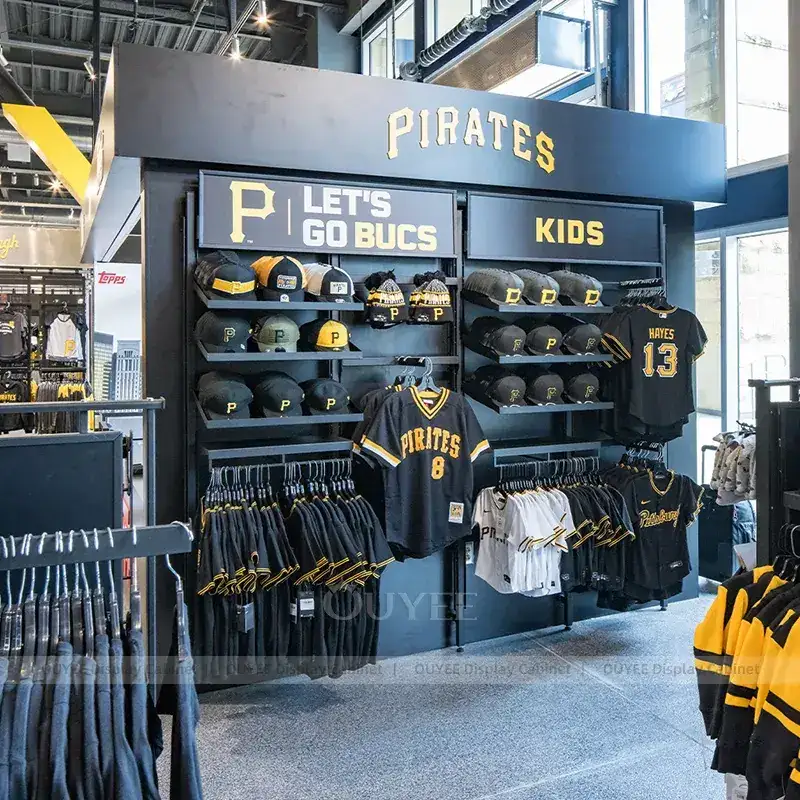 Black And Gold Team Apparel Store Fixtures With Brand Wall Displays 1