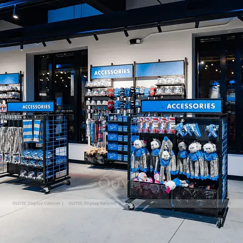 Blue Sports Team Store Fixtures With Hat Wall And Kids Apparel Displays 1