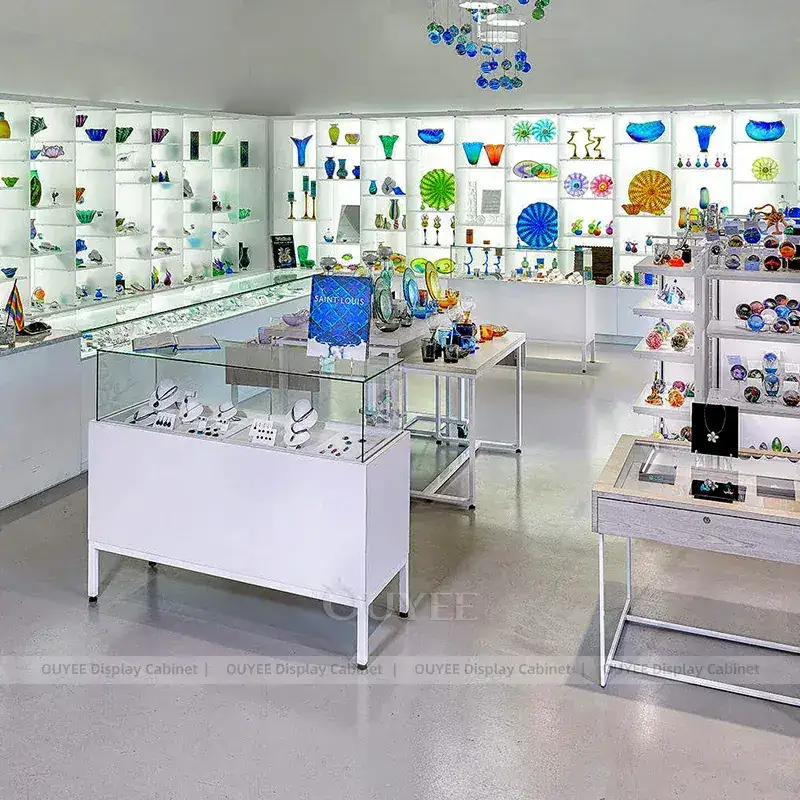 White Glass Gift Shop Fixtures With Mobile Display Shelves And Showcase Counters 1