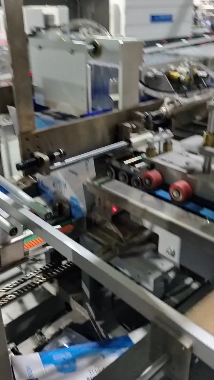 Confezionatrice automatica a 5 stazioni per bottiglie rotonde di acqua minerale, con sistema di sgancio a caduta - Serie WKD-DGB (tipo Y) 1