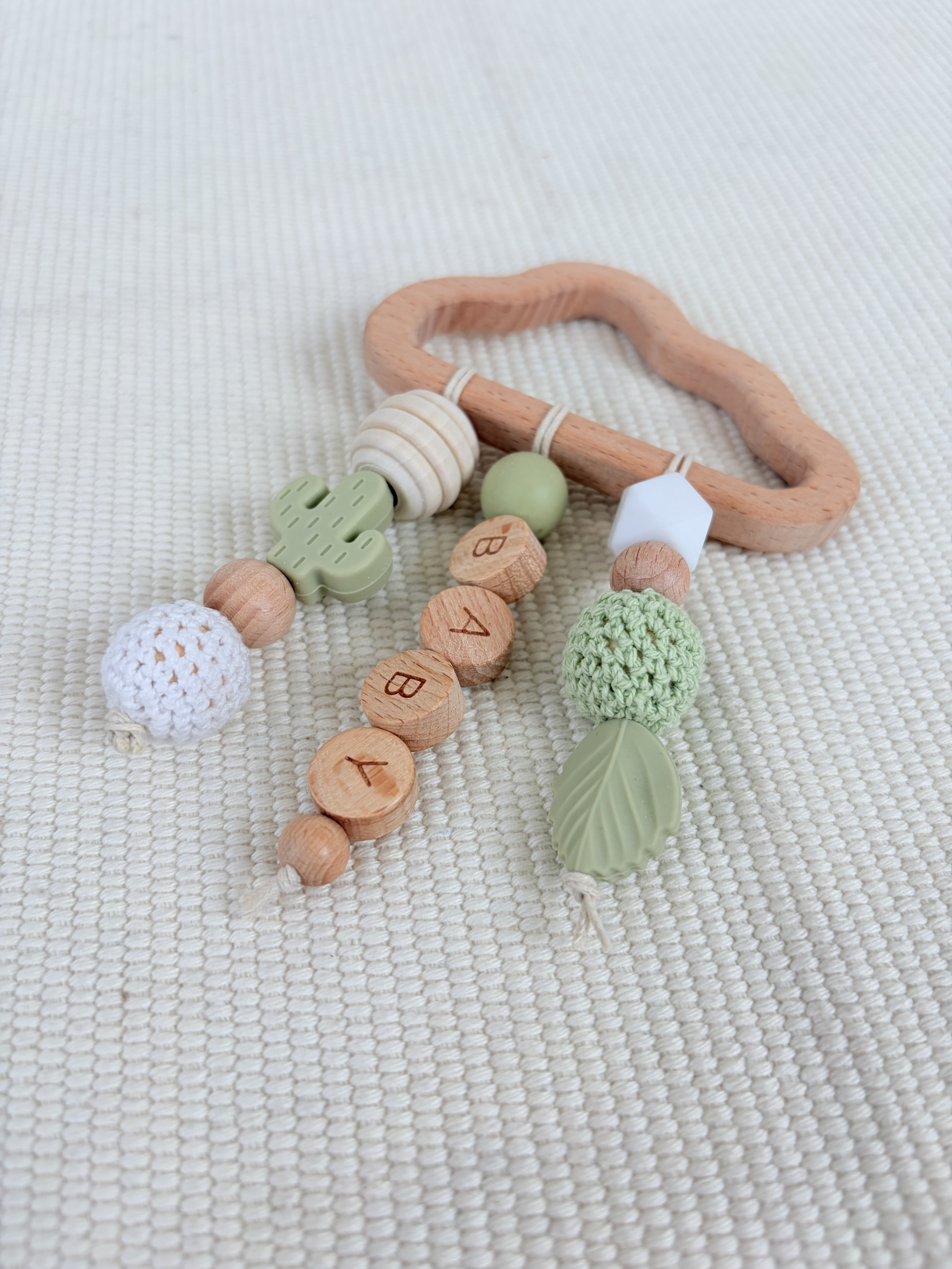 Đồ chơi treo nôi bằng gỗ hình đám mây Montessori cho bé, hạt silicon gặm nướt, lục lạc treo xe đẩy cho bé từ 0-24 tháng tuổi. 3
