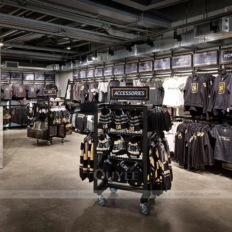 Dark Industrial Fan Shop Fixtures With Apparel Racks And Accessory Gondolas 1