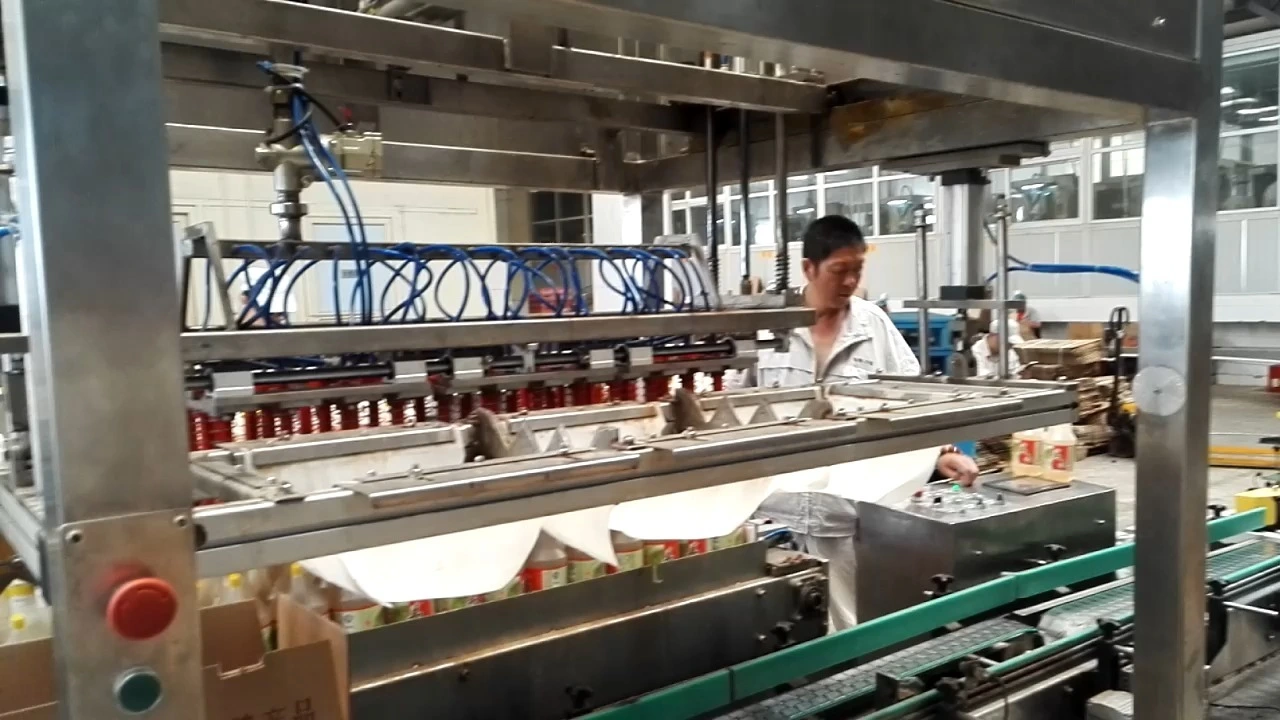 Confezionatrice automatica per l'aspirazione di bottiglie di aceto - Serie WKD-CZX (a tripla testa) 1