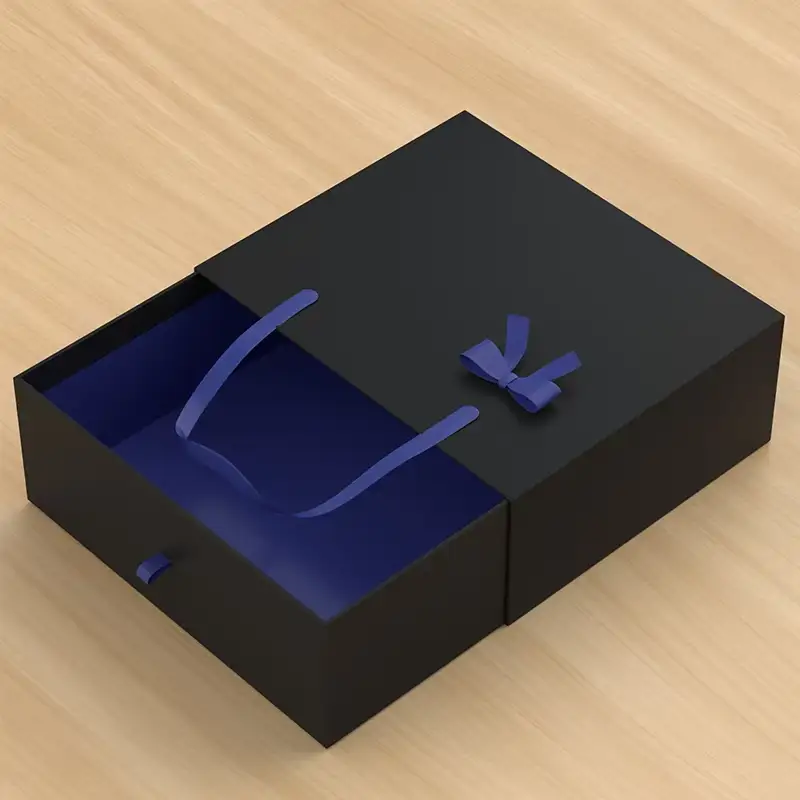 Coffret cadeau portable en forme de tiroir, noir et recyclable, pour collier et chapeau de luxe. Logo personnalisé, nœud en ruban bleu et fermeture magnétique. 1