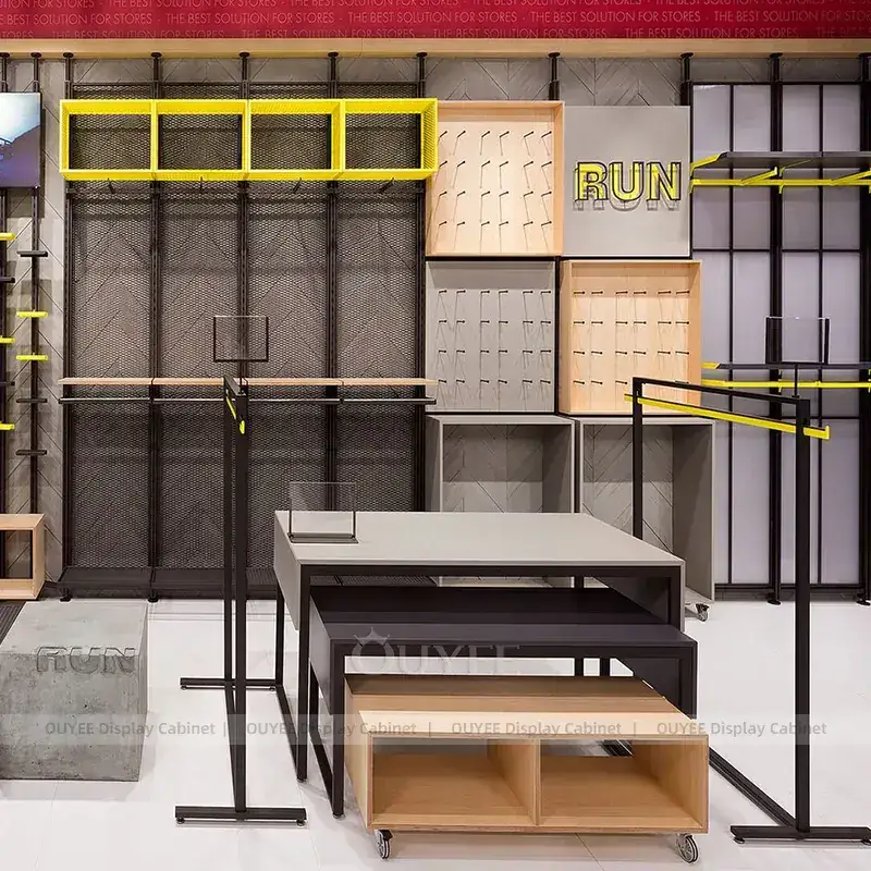 Premium Jeans Store Fixtures With Central Nesting Tables And Metal Wall Bays 1