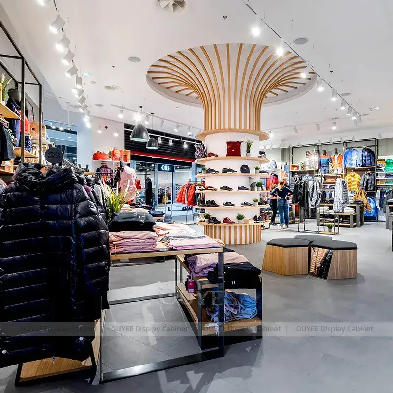 Contemporary Fashion Store Fixtures With Sculptural Tree Display And Round Cash Wrap 1