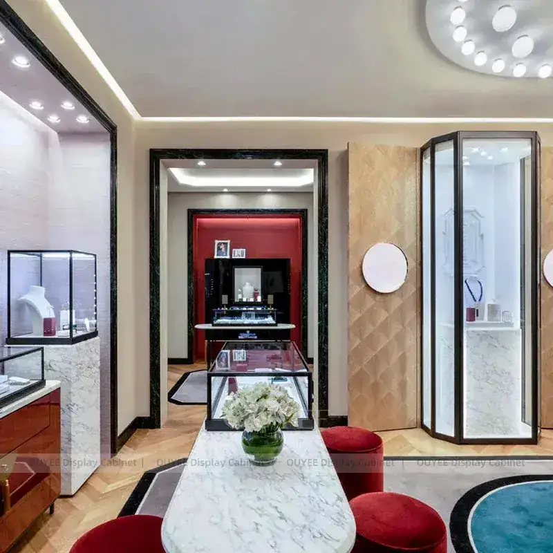 Elegant Champagne Gold Jewelry Boutique Display Cabinet With Marble Backdrop 1