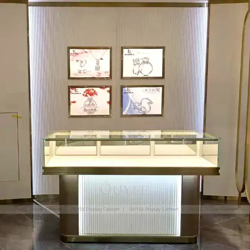 Elegant Cream Jewelry Boutique Display Cabinet With Marble Backdrop 1