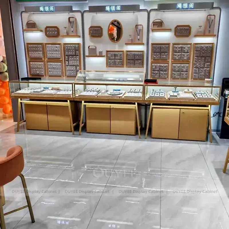 Elegant White Jewelry Boutique Display Cabinet With Marble Backdrop 1