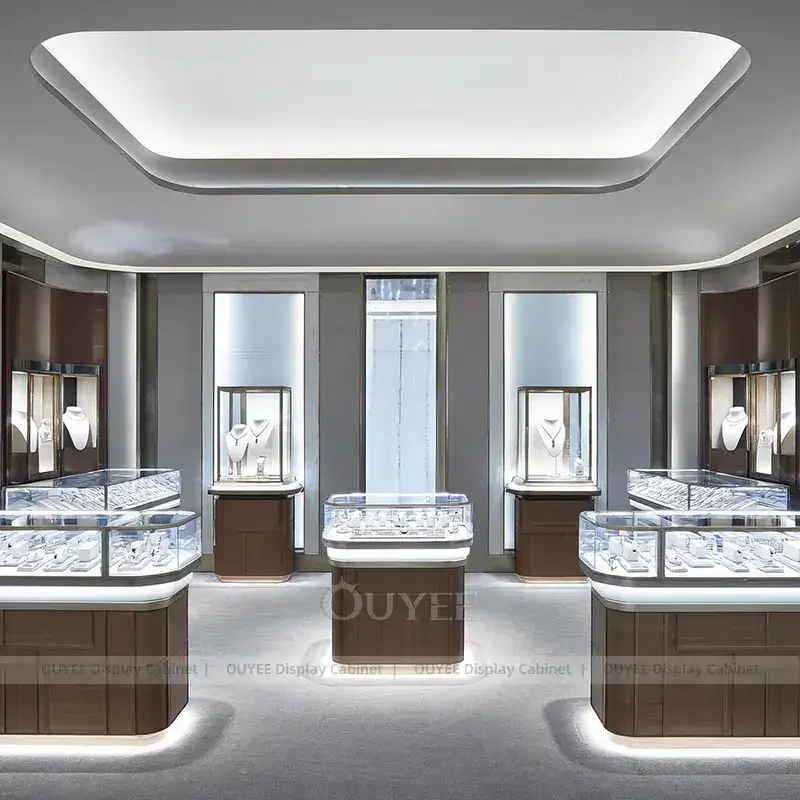 Sophisticated Beige Jewelry Store Display Table With Center Island Showcases 1