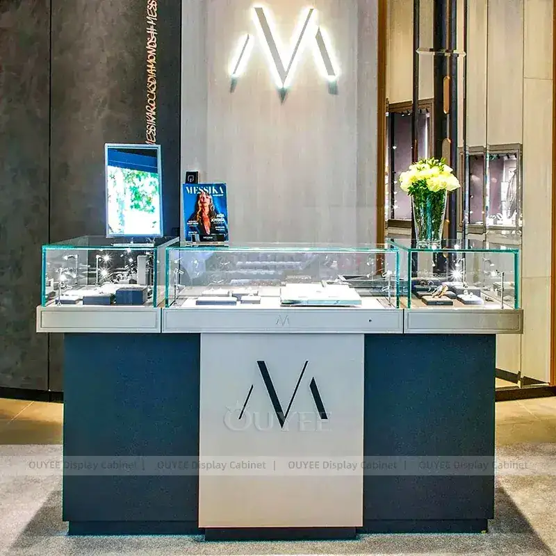 Sophisticated Black Jewelry Store Display Table With Curved Glass Islands 1