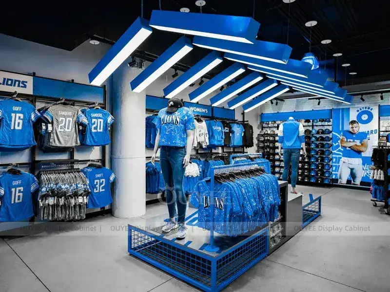 Espositore da parete per maglie della squadra blu con ripiani per cappellini 1