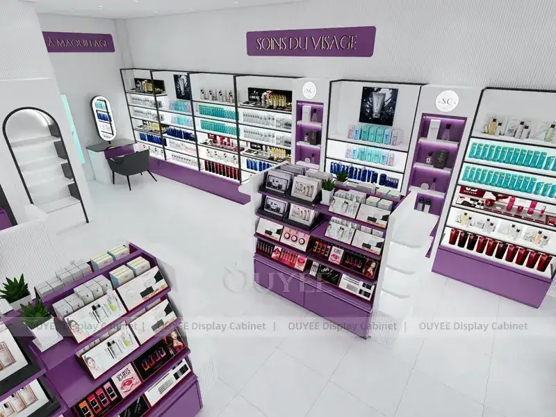Interno di un negozio di cosmetici viola e bianco con bancone con logo ad arco. 1